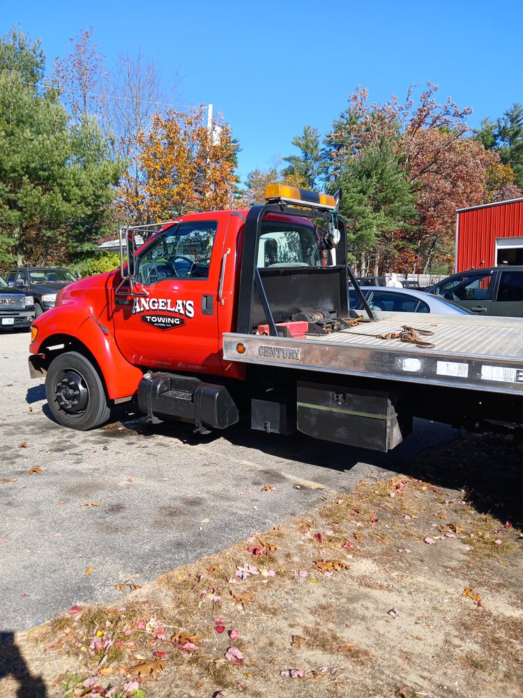 Angela's Towing flatbed at the FCC lot